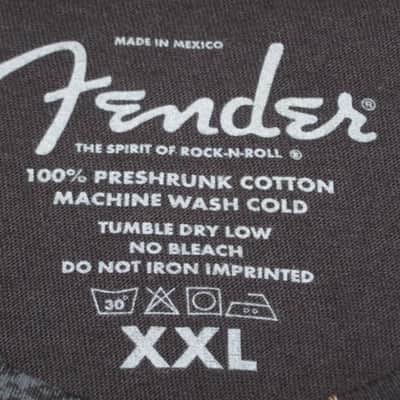 new old stock genuine Fender Heaven's Gate Custom Shop 100% Cotton Black Short Sleeve T-Shirt, XXL (XX-Large) (part #): 9101040806, early 2010s, GRAPHIC: Tan, Blue, Brown, Black (cross, 2 guitars, floral swirl, Fender, Custom Shop) NO: hang tag/packaging image 3