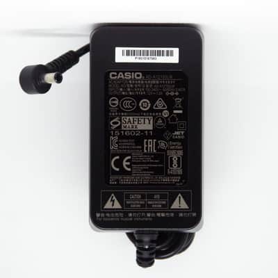 Casio AC Adaptor Power Supply AD-A12150LW(U) image 1
