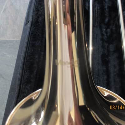 New Gold color trigger trombone. With case and mouthpiece. image 5