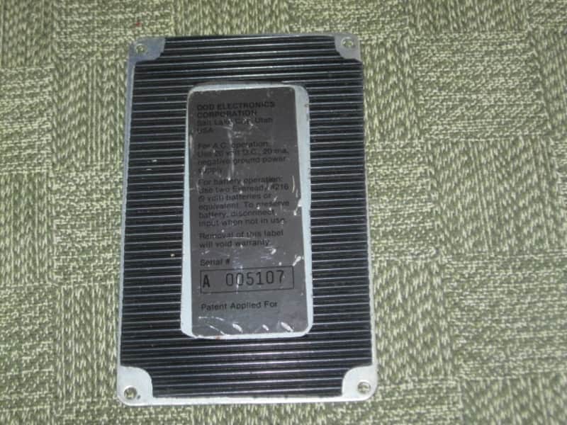 used vintage DOD Performer Series BOTTOM PLATE ( screw holes are on 4 corner areas) NO: pedal/other parts - early 1980s - Metal Plate has Silver & Gray Finish / Stiff Black Rubber Padding (padding has ridges) has Label, underside sanded & repainted gray image 1