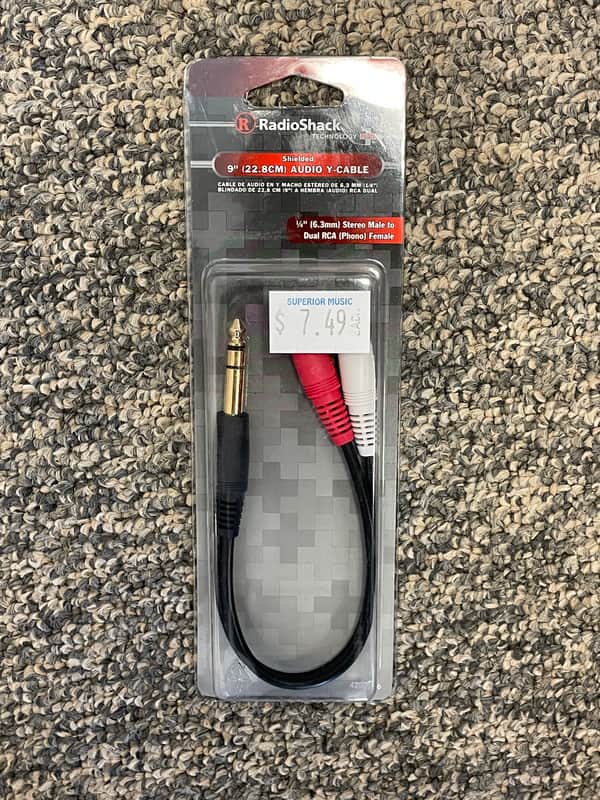Radio Shack 1/4” stereo male to dual RCA female - 9” - NEW image 1