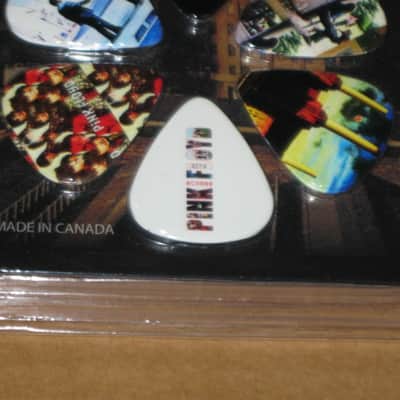 new in package (old stock) A+ Perri's Leather Ltd. / Perri's 12 Pack Of Pink Floyd Guitar Picks - Med Gauge - Celluloid Plastic, 351 shape - but slightly curved (LP12-PF1) LP12PF1 image 25