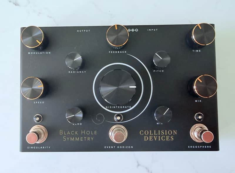 Collision Devices Black Hole Symmetry
