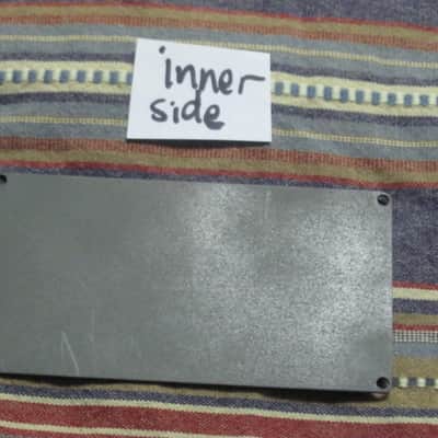used Boss bottom plate (NO: rubber padding,label,serial number) for compact sized pedal - specifically from mid 1980s - metal, OUTER side: semi-gloss gray fiish / INNER side: flat gray finish -- back end has factory made small cut out for power jack image 16