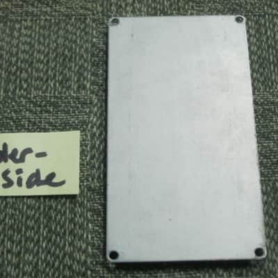 used medium relic'd genuine Boss Bottom Plate (Silver Label Taiwan) for compact (regular) size pedal, from March 1991 - PLATE PART: Metal w/ Silver Finish / BOTTOM LABEL: SLT / EXTERIOR PADDING: Black stiff hardened rubber - NO: pedal/screws/other items image 5