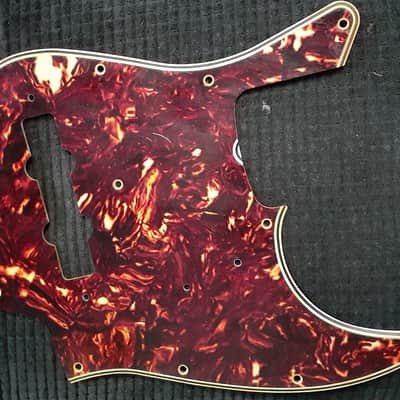 Vintage 1960s Fender Jazz Bass tortoise shell 10 hole pickguard image 1