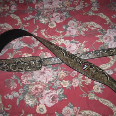 lite use RockYou (Rock You) PU Faux Leather Snakeskin Pattern Guitar Strap (front: brown, tan, black pattern) (back: black) reversible - main part of strap 2 & 3/4" wide, belt part 1 & 1/4" wide [polyurethane leather] Adjustable Length from 44" to 53" image 1