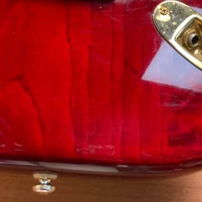 Squier Pro Tone Stratocaster with Rosewood Fretboard in Crimson Red Transparent 1997 image 4