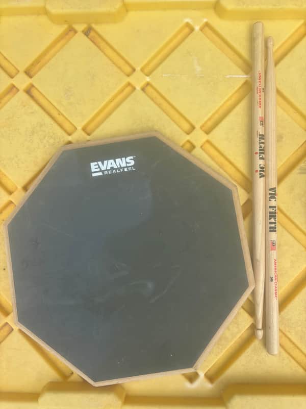 Evans RealFeel Drum Pad and Vic Firth 5B image 1