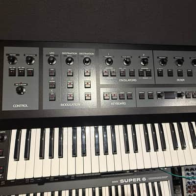 Oberheim OB-X8 61-Key 8-Voice Synthesizer 2022 - Present - Black with Wood Sides