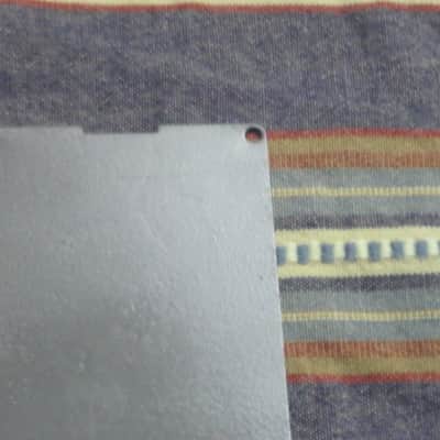used Boss bottom plate (NO: rubber padding,label,serial number) for compact sized pedal - specifically from mid 1980s - metal, OUTER side: semi-gloss gray fiish / INNER side: flat gray finish -- back end has factory made small cut out for power jack image 13
