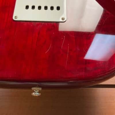 Squier Pro Tone Stratocaster with Rosewood Fretboard in Crimson Red Transparent 1997 image 7