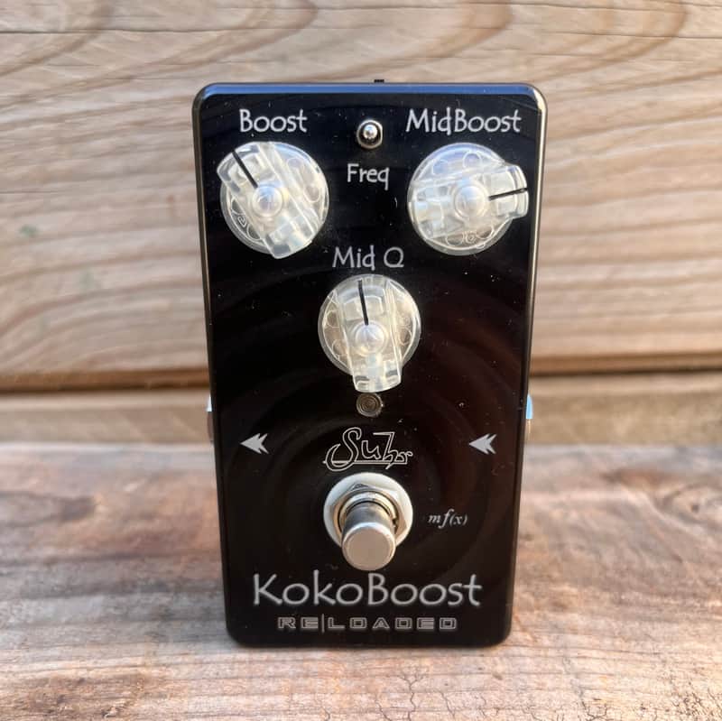 Black audio effects pedal with knobs labeled Boost, MidBoost, Freq, Mid Q, and mfi(x).