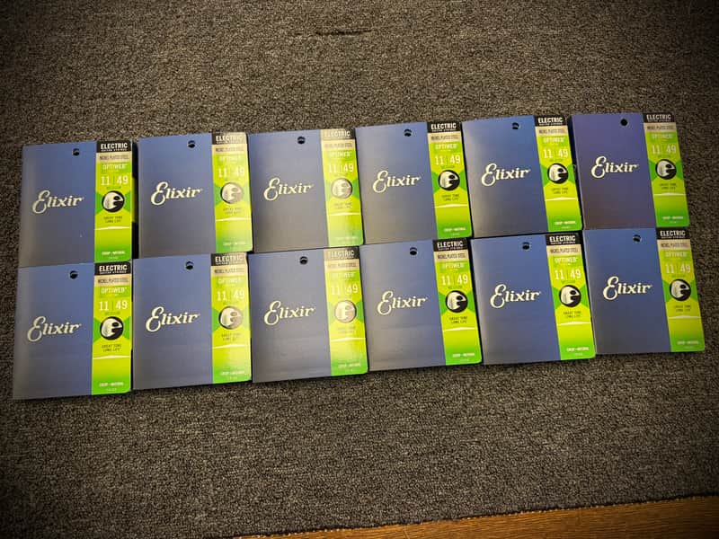 12 Individual Packs of Elixir 19102 Optiweb Nickel Plated Steel Electric Guitar Strings - Medium (11-49) image 1