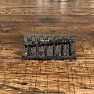 ESP LTD 6 String Bass Bridge Black Chrome Used image 1
