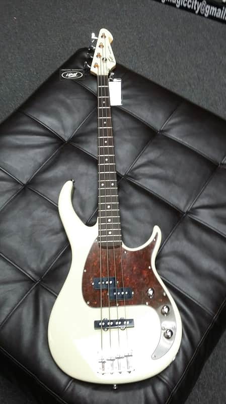 Peavey Milestone 4-String Electric Bass Ivory image 1