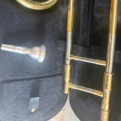 Immagine Gold color trigger trombone, With case and mouthpiece. Large bore - 4