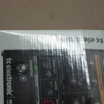 litely handled TC Electronic EMPTY Cardboard Box + original User's Manual & sticker for NDR-1 Nova Drive OD & Distortion (NO: pedal, adapter) late 2000s-early 2010s (part of 2 outer sides of BOX were spray painted white to cover water stains) image 4