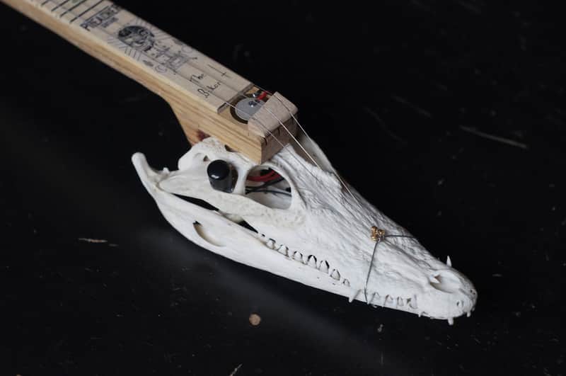 Cigarbox guitar 3 string crocodile skull guitar image 1