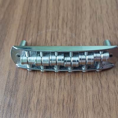 Fender 008-12 Mustang Guitar Bridge with Bridge Posts 2010s - Chrome image 1