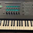 Oberheim Matrix 12 61-Key 12-Voice Synthesizer 1985 - Black