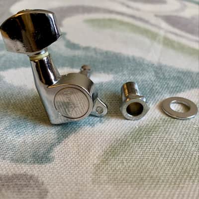 1 Squier Logo Guitar Tuner / Machine Head (2009) Vintage Style 45 degree Mounting Tab image 1