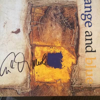 Al Di Meola Orange and blue signed vinyl image 1