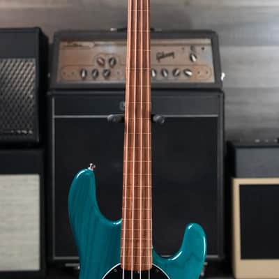 Ernie Ball Music Man StingRay 4 H Fretless Bass Translucent Teal - Used image 5