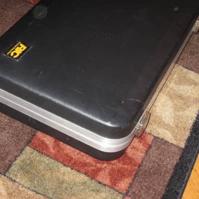 used Rickenbacker Hardshell Case for Model 620 electric guitar (NO guitar) from 1995, 2 Ball feet broke off (2 holes in plastic), Exterior plastic has some cracks,  EXT: Black Hard Plastic / Chrome HW / Handle: Black Molded Hard Plastic / INT: Blue Plush image 21