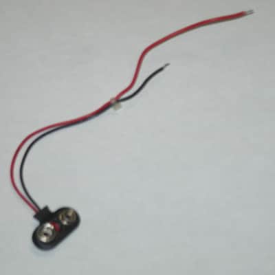 ONE very lightly used genuine Boss 9v battery clip [specifically for Boss pedals that use battery clip with black plastic covering near the terminal part (which are most of them) - but can be a replacement for the gray battery clip] image 21