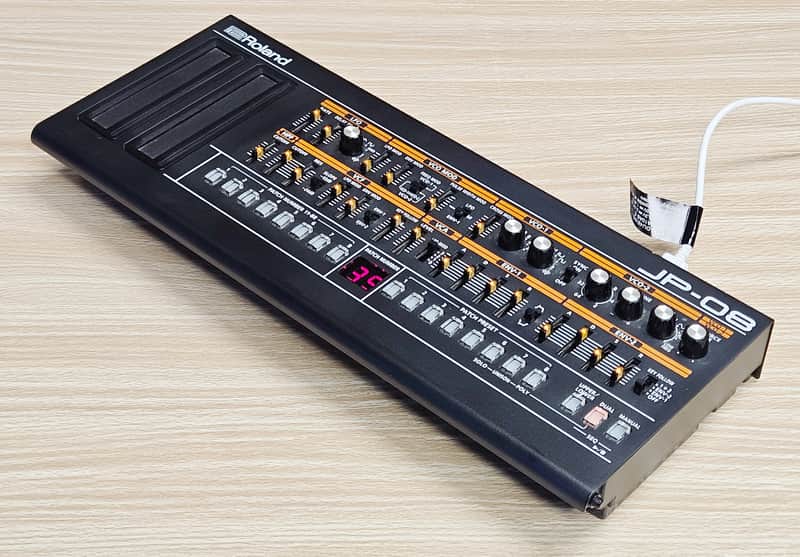 Roland JP-08 Boutique Digital Synthesizer Sound Module With Red Color 30 Degree Angled Stands image 1