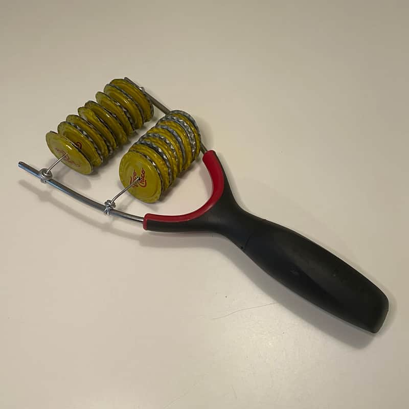 Upcycled Percussion - Slingshot Shaker - Topo Chico Bottle Caps image 1