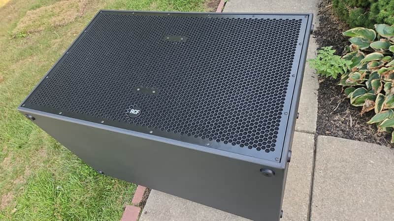RCF SUB-8006-AS Dual 18" Active Subwoofer with protective case and 4 caster locking wheels image 1