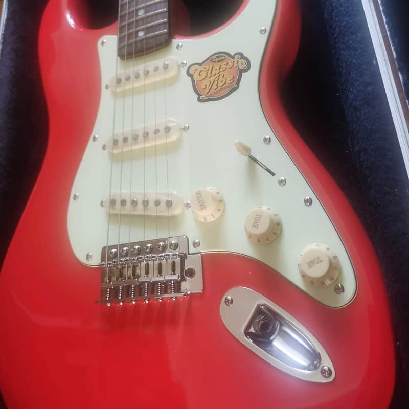 2010 – 2019 Squier Simon Neil Stratocaster Fiesta Red
