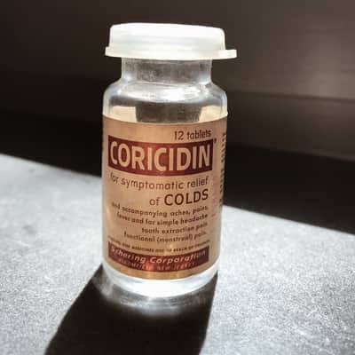 VINTAGE Coricidin Bottle 70's (small size) image 1
