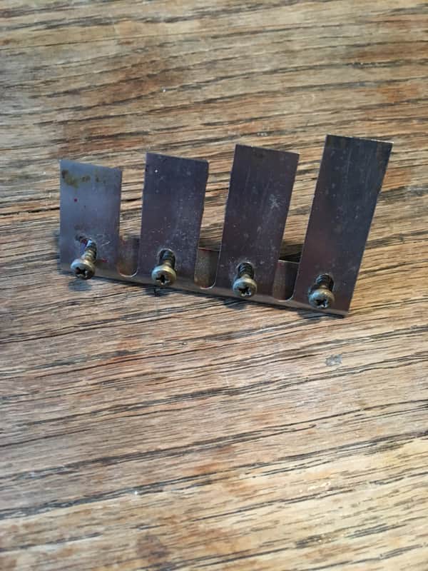 Vintage 1960s Fender Mustang Bass mute w/screws image 1