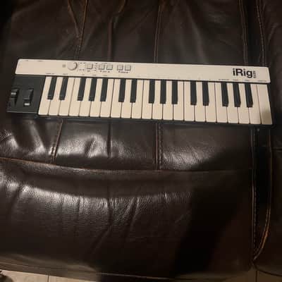 IK Multimedia iRig Keys 37-Key Mobile MIDI Keyboard Controller with Lightning 2010s - White image 1