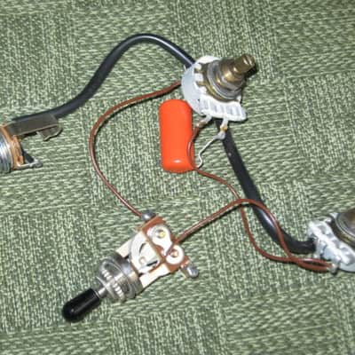 used 1997 Gibson control harness: 1 vol pot & 1 tone pot short shaft +nut/washer,wires,wire insualtion,capacitor,jack+nut/washer,switch +switch tip,nut +comes w/ new switch washer (NO other parts included) from The Hawk guitar (guitar NOT included) image 7