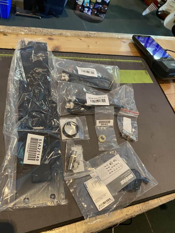 A box of goodies that accompany a Shure Wireless System image 1