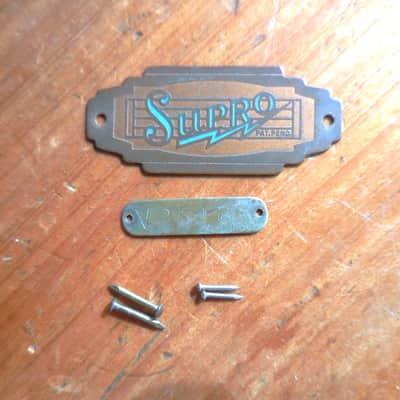 Supro Brass and Enamel Metal Headstock Emblem with Ser. Number plate. image 1