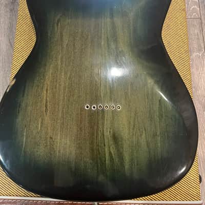 Wanderkauven Electric guitar - Transparent green burst finish with visible wood grain image 4