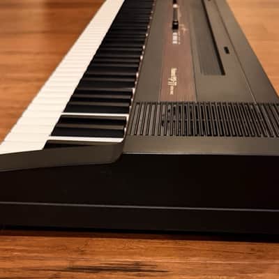 Roland ep-77 Digital Piano 76 Note Musical Keyboard w/Power Cable & Stand image 8