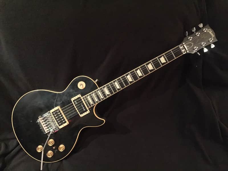 Neal Schon (formerly owned) Gibson Black Les Paul Deluxe with Floyd Rose image 1
