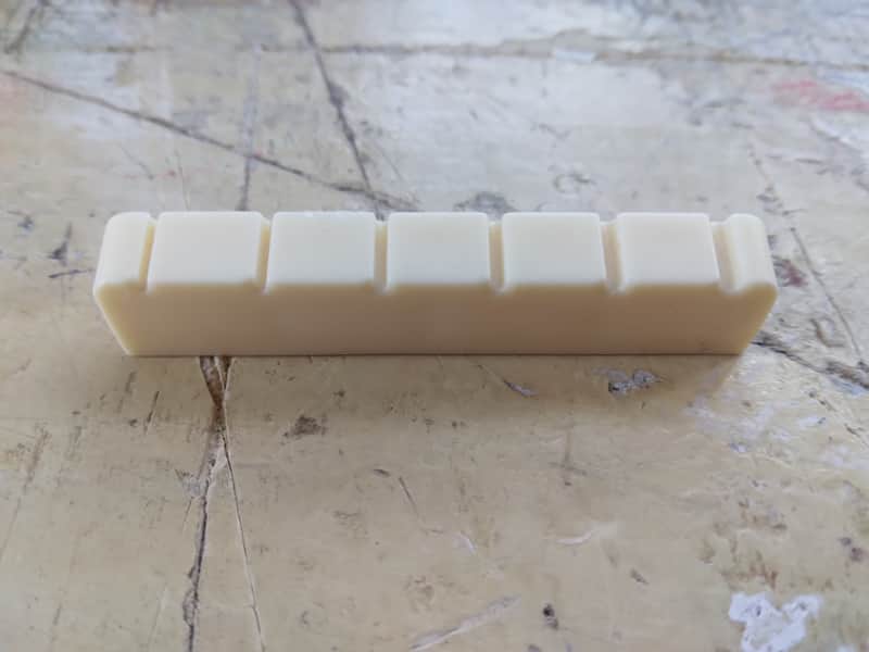 Unbranded Plastic Guitar Nut 1960s - White image 1