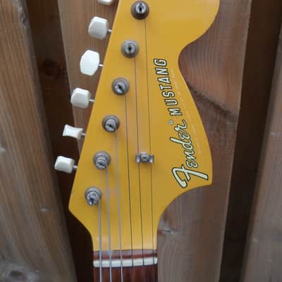 1969 Fender Mustang Custom Orange with racing stripes Excellent image 3