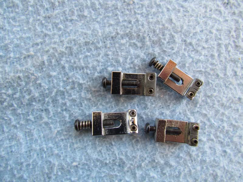 Vintage Fender Stratocaster Bridge Saddles Set Of 4 1970's Era Fender Stratocaster Bridge Saddles Part Number 027037 Set Of 4 image 1