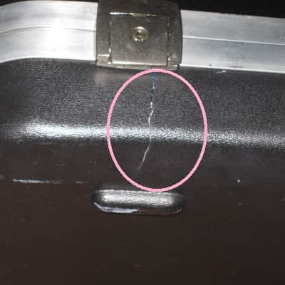 used Rickenbacker Hardshell Case for Model 620 electric guitar (NO guitar) from 1995, 2 Ball feet broke off (2 holes in plastic), Exterior plastic has some cracks,  EXT: Black Hard Plastic / Chrome HW / Handle: Black Molded Hard Plastic / INT: Blue Plush image 15