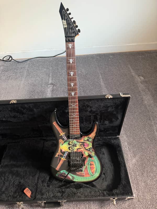 ESP Skulls & Snakes George Lynch Signature 1986 - Present - Black with Skulls & Snakes Graphic