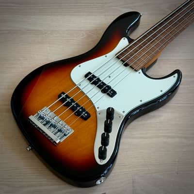 Carvin AC50 Fretless with clear, quilt maple top | Reverb