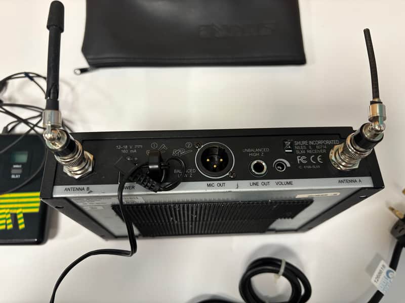 Shure SLX4 with SLX1 beltpack and Sennheiser ME104 cardioid tie clip mic 2005 - black steel with plastic beltpack image 1